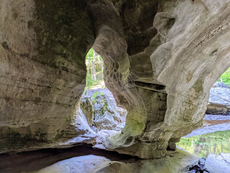 A massive stone pillar at the entrance of Carter Caves in Kentucky.