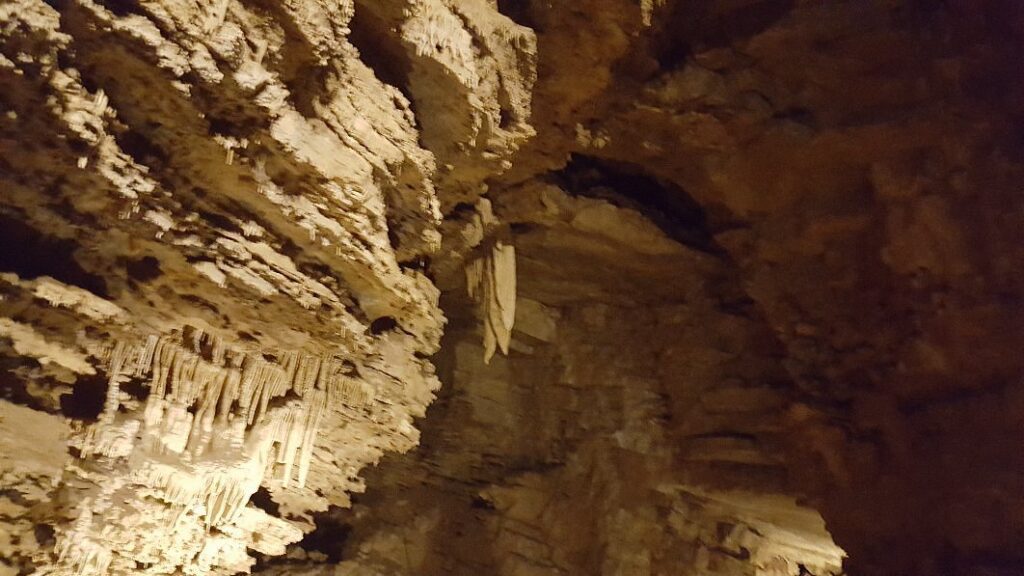A look at the flowwall and stalactites hanging down from the walls in Minnetonka Cave.